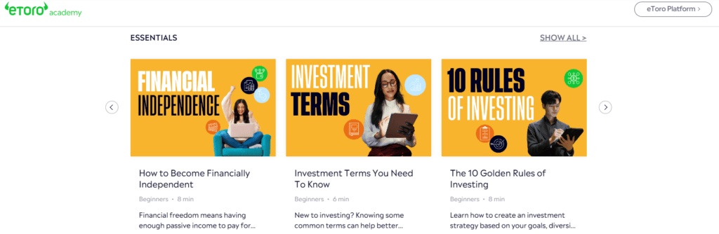 eToro Academy Essentials section showcasing beginner-friendly courses on financial independence, investment terms, and investing rules with vibrant thumbnails and course durations – 2025